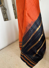 ISHWARYA- RUST BLACK CHECKED NARAYANPET WITH ZARI DETAILS
