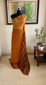 AVEYA- MUSTARD PURE GEORGETTE WITH BAGH PRINT CONTRASTS