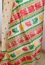 REENU – CREAM ASSAM TUSSAR SILK SAREE WITH MULTICOLOR MOTIFS
