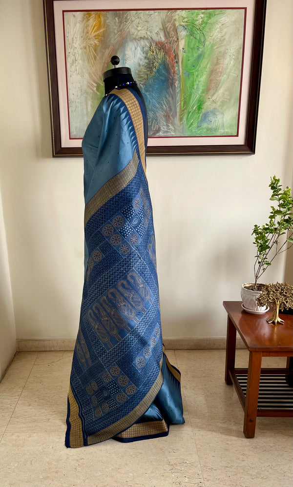 SAROJBALA – STEEL GREY BOMKAI WITH MOTIF-RICH DRAMATIC AANCHAL