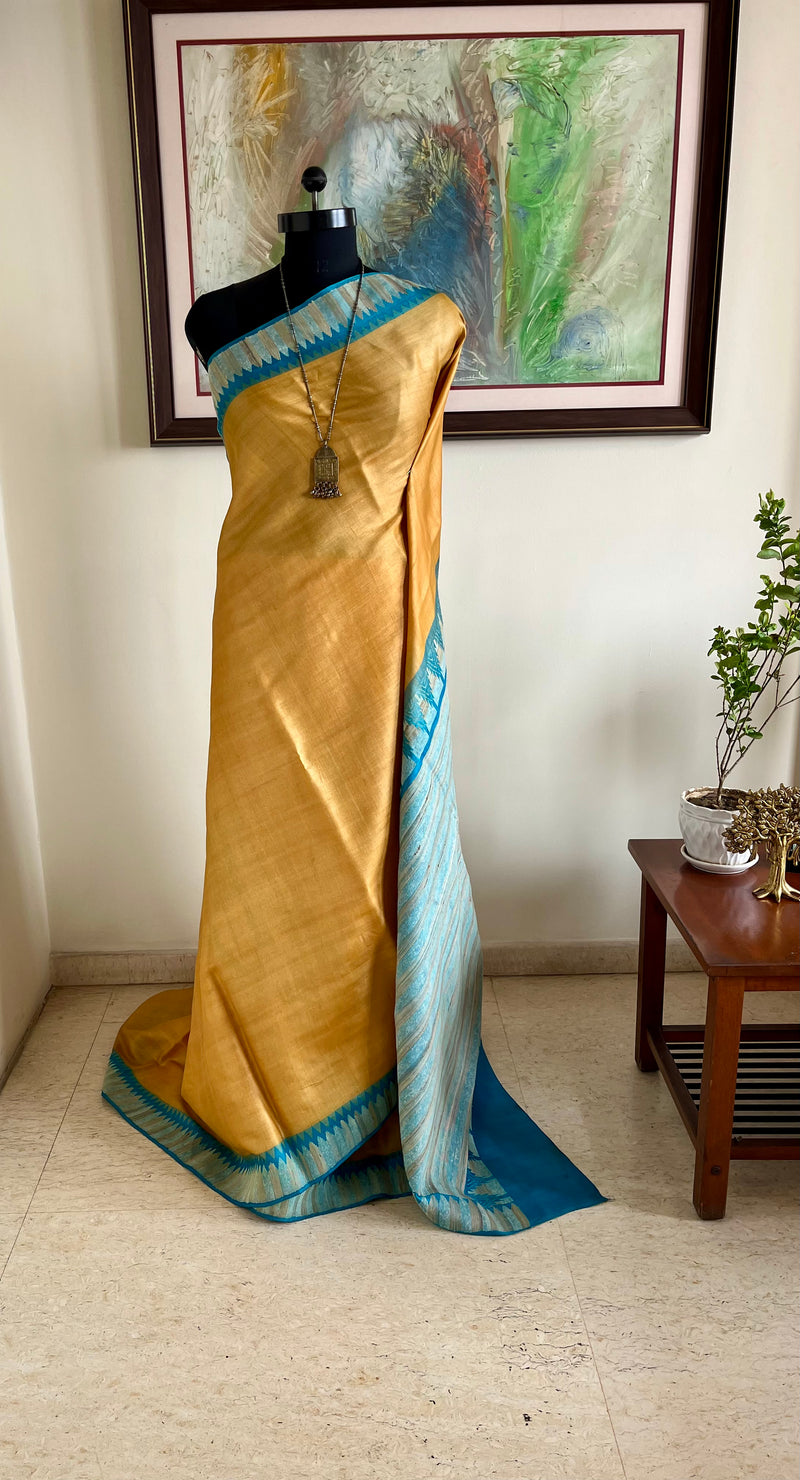 AVNIYA – BEIGE CREAM TUSSAR WITH BLUE TEMPLE BORDER AANCHAL