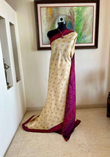 DHANURIKA – CREAM PUTAPAKKA IKKAT WITH MAGENTA AANCHAL