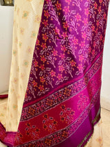 DHANURIKA – CREAM PUTAPAKKA IKKAT WITH MAGENTA AANCHAL