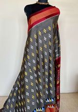 AAKARSHA- GREY RAJKOT PATOLA WITH MAROON, ORANGE AND ZARI ACCENTS