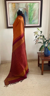 AARUNYA – RUST KANJIVARAM WITH ALL-OVER WOVEN MOTIFS