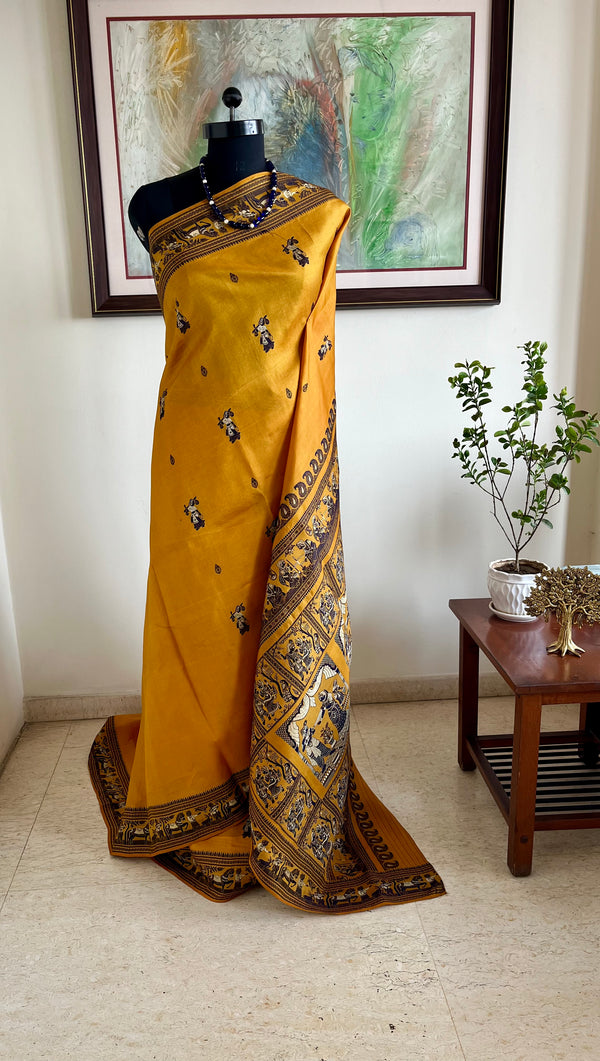 ARSHI- MUSTARD BALUCHARI WITH BLACK MOTIFS AND MYTHOLOGICAL ANCHAL