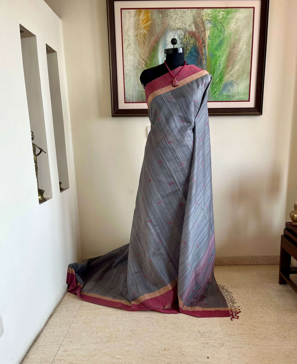 AAVAYA-GREY TUSSAR WITH PINK PEACH BORDER AND MOTIFS