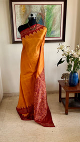 ANUSHRUTI – BURNT ORANGE KHANDUA WITH BANDHA MOTIFS
