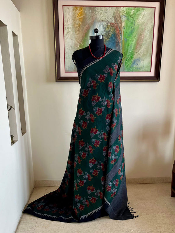 SUBHRAJA – GREEN NUAPATNA COTTON WITH HIBISCUS AND STRIPED AANCHAL