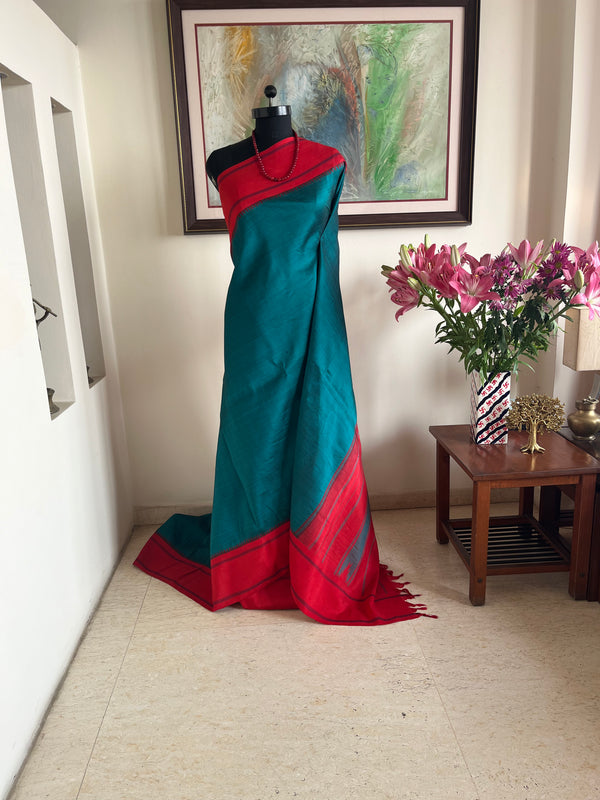 TANISI- TEAL KANJIVARAM WITH RED BORDER AND THAZAMPU AANCHAL