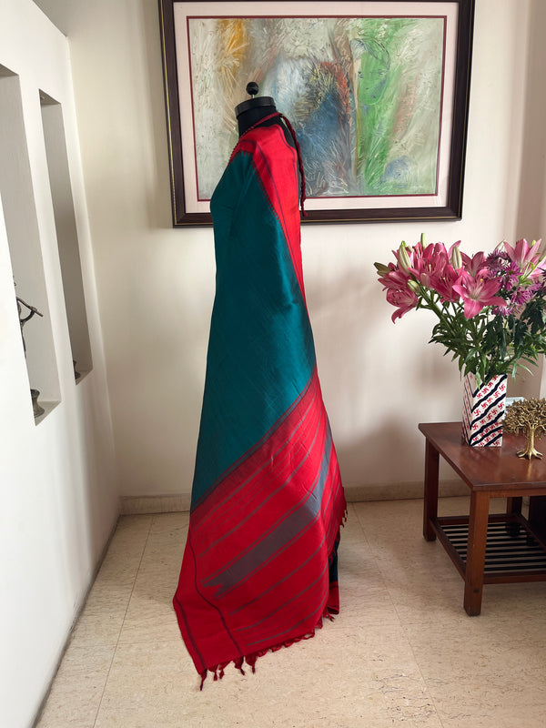 TANISI- TEAL KANJIVARAM WITH RED BORDER AND THAZAMPU AANCHAL