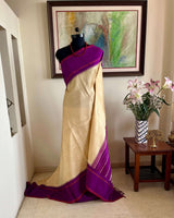 KARTIKA-KORVAI KANJIVARAM IN CREAM WITH PURPLE PETNI AANCHAL