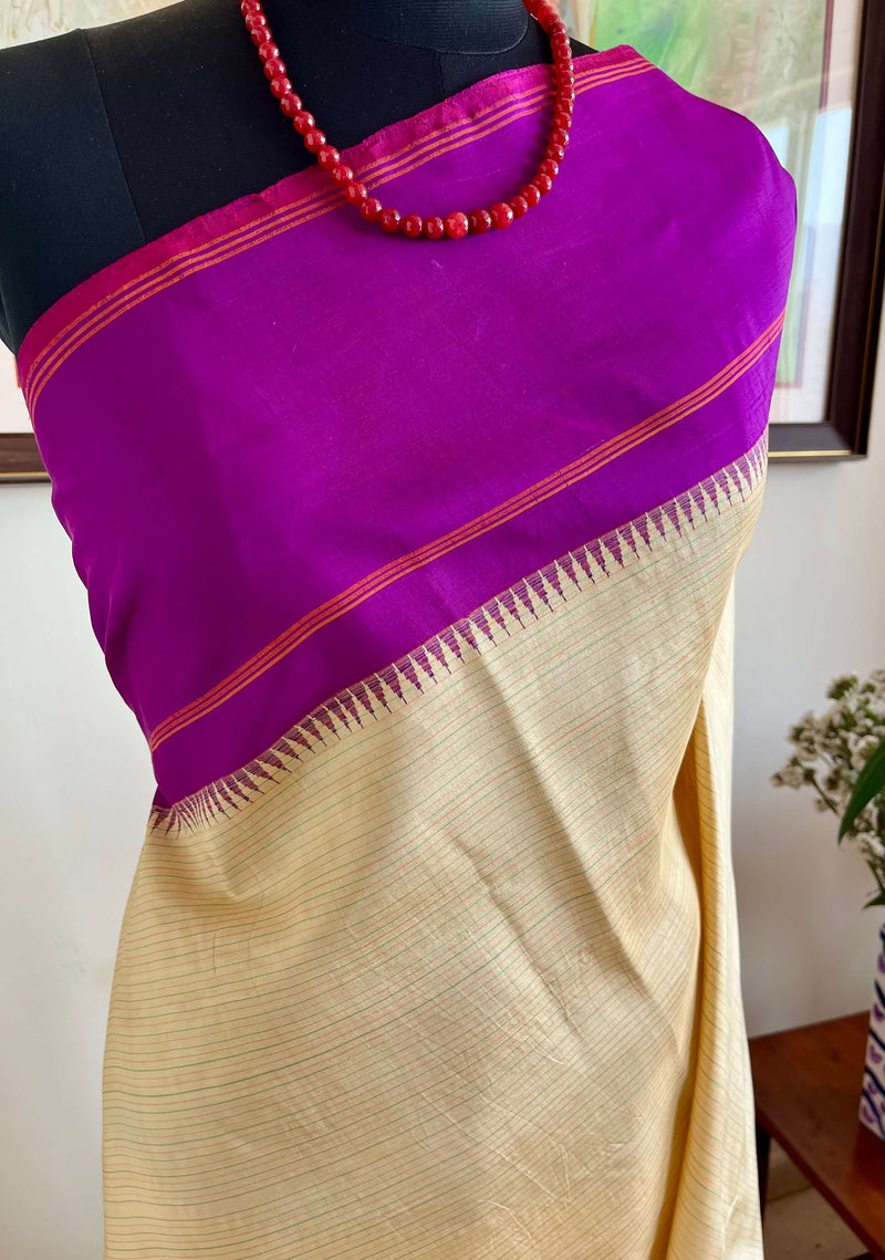 KARTIKA-KORVAI KANJIVARAM IN CREAM WITH PURPLE PETNI AANCHAL