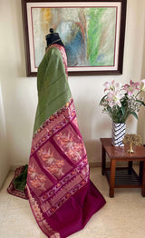 KAAMINI- MEHENDI GREEN COTTON HANDLOOM WITH MAROON BORDER, INTRICATE THREADWORK IN THE AANCHAL