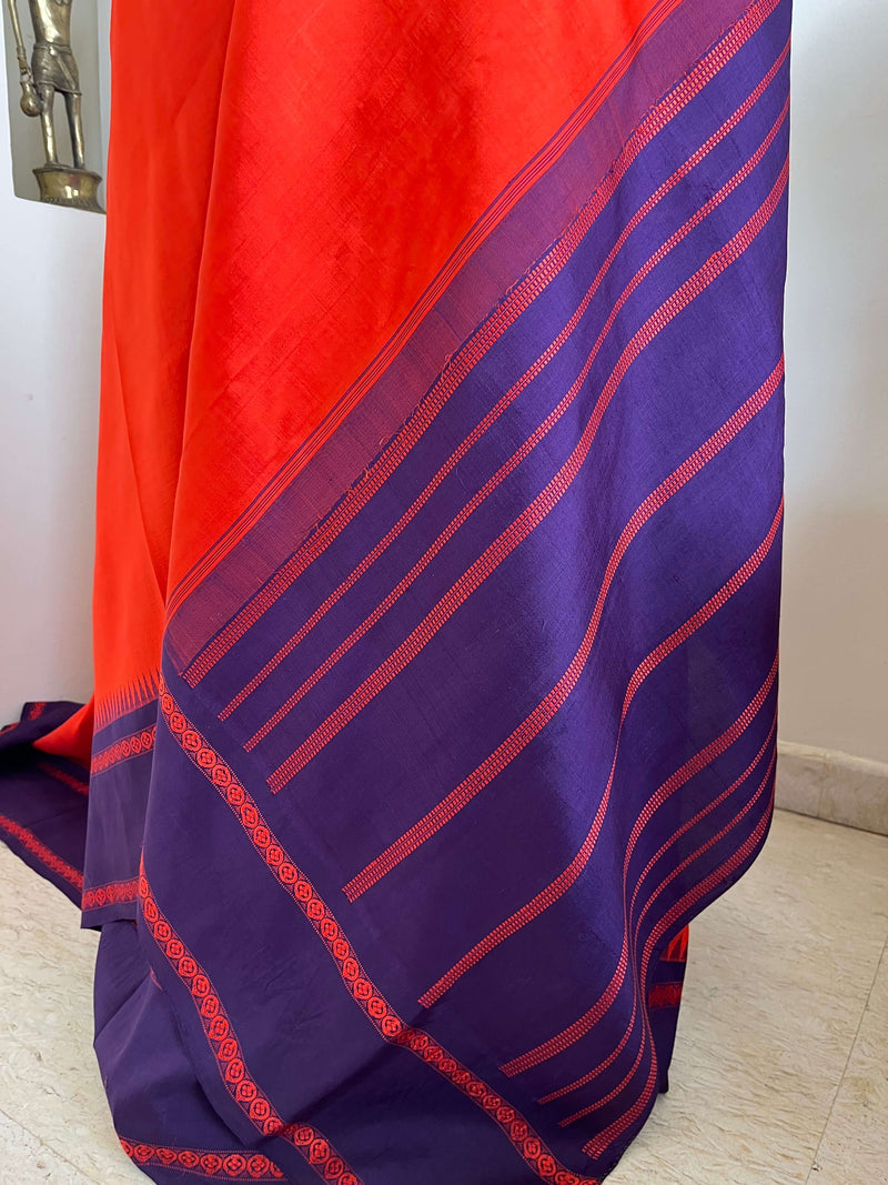 LIRANYA- CHILLI RED KORVAI KANJIVARAM WITH NAVY PURPLE PETNI AANCHAL