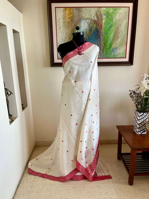 PRAGYASHREE – WHITE ASSAM SILK WITH RED BORDERS & BLOOMS