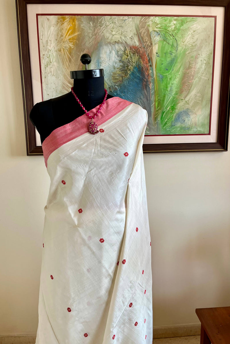 PRAGYASHREE – WHITE ASSAM SILK WITH RED BORDERS & BLOOMS