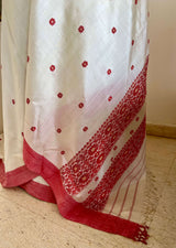PRAGYASHREE – WHITE ASSAM SILK WITH RED BORDERS & BLOOMS