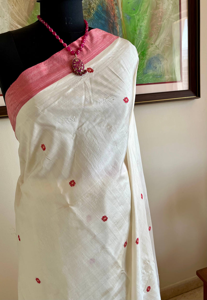 PRAGYASHREE – WHITE ASSAM SILK WITH RED BORDERS & BLOOMS