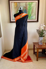 MAADHULYA-BOLD BLACK KORVAI KANJIVARAM WITH ORANGE AND GOLD PAISLEYS