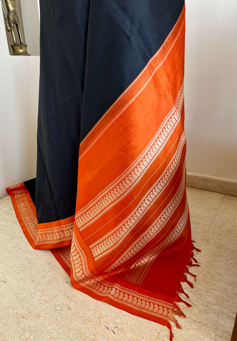MAADHULYA-BOLD BLACK KORVAI KANJIVARAM WITH ORANGE AND GOLD PAISLEYS