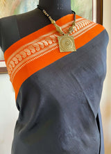 MAADHULYA-BOLD BLACK KORVAI KANJIVARAM WITH ORANGE AND GOLD PAISLEYS