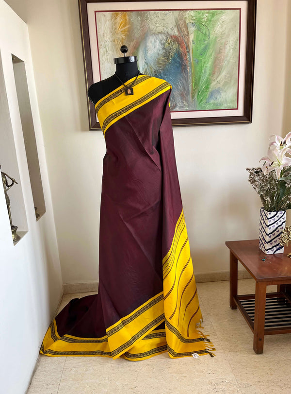 PRADEEPA – CHOCOLATE BROWN KORVAI KANJIVARAM WITH KOLAM BORDER