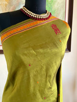 OORMIKA – KANJIVARAM SILK IN RICH GREEN AND ORANGE