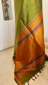 OORMIKA – KANJIVARAM SILK IN RICH GREEN AND ORANGE