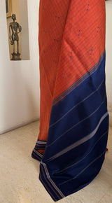 IRAAVATI – A RUST KANJIVARAM WITH STRIKING NAVY BLUE CONTRASTS