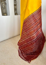 SEBA- YELLOW KHANDUA SILK WITH MAROON TEMPLE BORDER AND AANCHAL