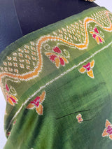 MISHA- EXQUISITE GREEN PATOLA WITH MAROON, OCHRE AND OFF-WHITE MOTIFS