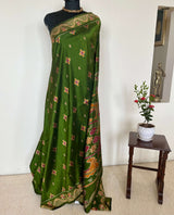 MISHA- EXQUISITE GREEN PATOLA WITH MAROON, OCHRE AND OFF-WHITE MOTIFS