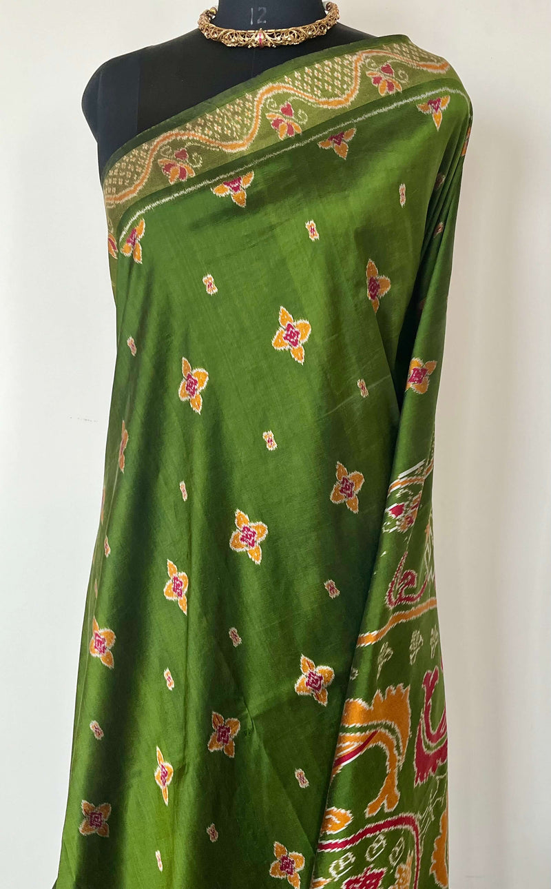 MISHA- EXQUISITE GREEN PATOLA WITH MAROON, OCHRE AND OFF-WHITE MOTIFS