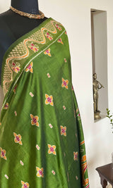 MISHA- EXQUISITE GREEN PATOLA WITH MAROON, OCHRE AND OFF-WHITE MOTIFS