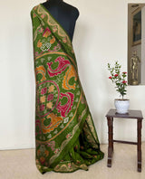 MISHA- EXQUISITE GREEN PATOLA WITH MAROON, OCHRE AND OFF-WHITE MOTIFS