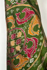 MISHA- EXQUISITE GREEN PATOLA WITH MAROON, OCHRE AND OFF-WHITE MOTIFS