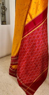 PRAYUTA – BURNT ORANGE POCHAMPALLY WITH DIAMOND IKKAT