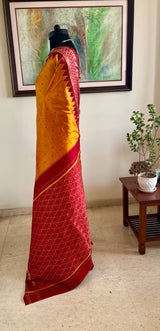 PRAYUTA – BURNT ORANGE POCHAMPALLY WITH DIAMOND IKKAT