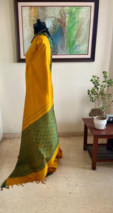MAITREIKA – MUSTARD KANJIVARAM WITH AN ABUNDANT FLORAL AANCHAL