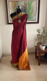 MEGAVALLI – MAROON KANJIVARAM WITH TEAL BORDER AND TEMPLE MOTIFS