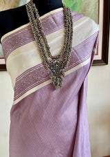 SRUTIKA – PASTEL MAUVE KANJIVARAM WITH OFF-WHITE FLORAL BORDER