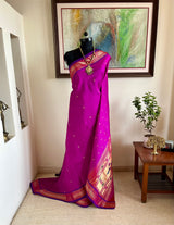 MADHUJA- BOLD MAGENTA PAITHANI WITH MOR KUNDA & NARALI BORDER