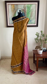 AROHIKA – OLIVE BROWN SAMBALPURI SILK WITH A BANDHA FLORAL AANCHAL