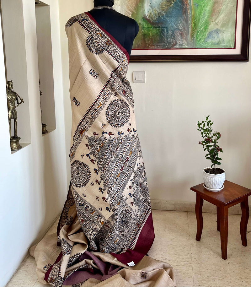 AYLA- PEACHISH BEIGE TUSSAR WITH VIBRANT TRIBAL ART MOTIFS