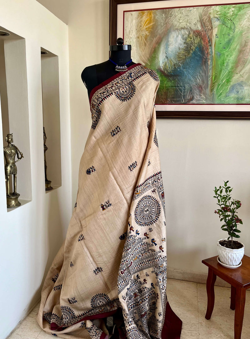 AYLA- PEACHISH BEIGE TUSSAR WITH VIBRANT TRIBAL ART MOTIFS