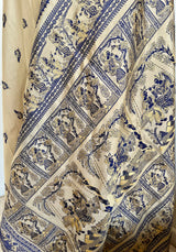 RITWIKA- ELEGANT BEIGE BALUCHARI SILK WITH RADHA-KRISHNA AND PEACOCK MOTIFS