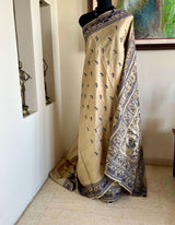 RITWIKA- ELEGANT BEIGE BALUCHARI SILK WITH RADHA-KRISHNA AND PEACOCK MOTIFS