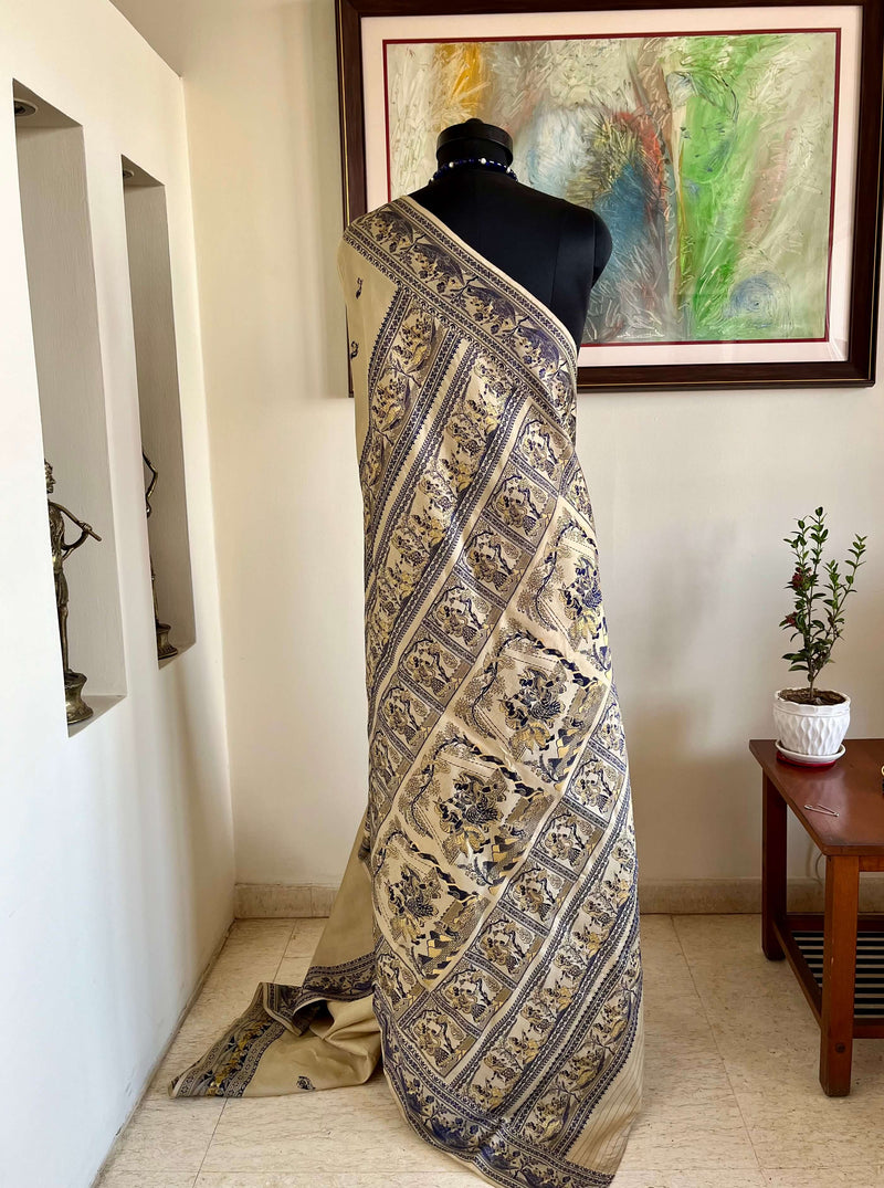 RITWIKA- ELEGANT BEIGE BALUCHARI SILK WITH RADHA-KRISHNA AND PEACOCK MOTIFS