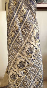 RITWIKA- ELEGANT BEIGE BALUCHARI SILK WITH RADHA-KRISHNA AND PEACOCK MOTIFS